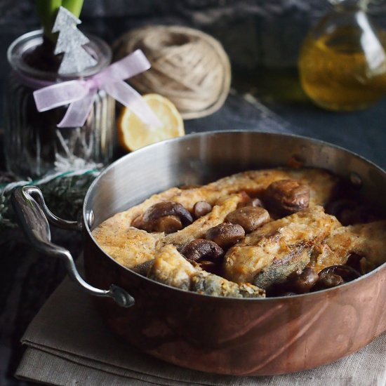 Carp baked with mushrooms