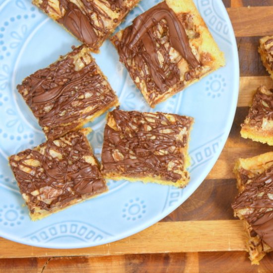 Gooey Snickers Cake Bars