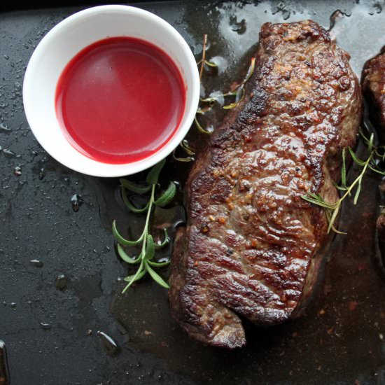 Beef steaks with citrus sauce