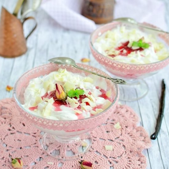 Dessert with cream and roses jam