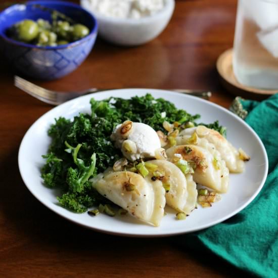 Vegan pierogi with sautéed kale