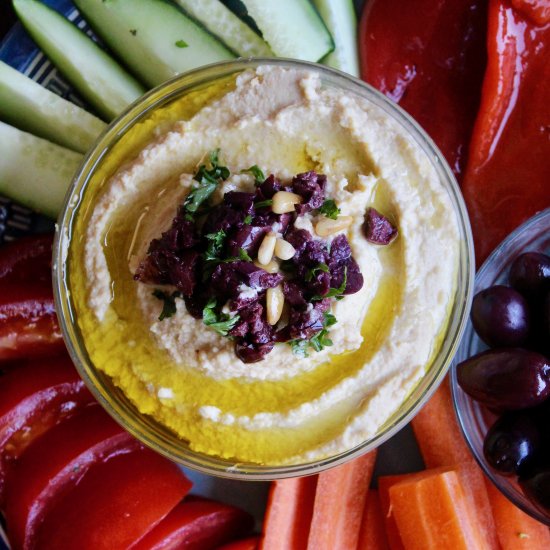 Hummus with Olives and Pine Nuts