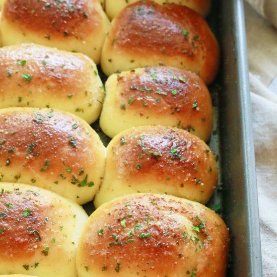 Cheesy, Garlicky Parker House Rolls