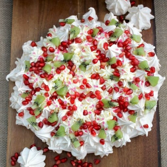 Pomegranate and kiwi crown pavlova