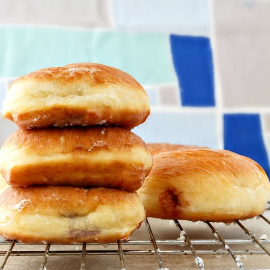 Glazed Raspberry Filled Doughnuts