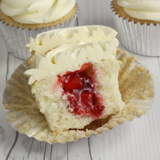 White Cupcakes w/ Strawberry Filling