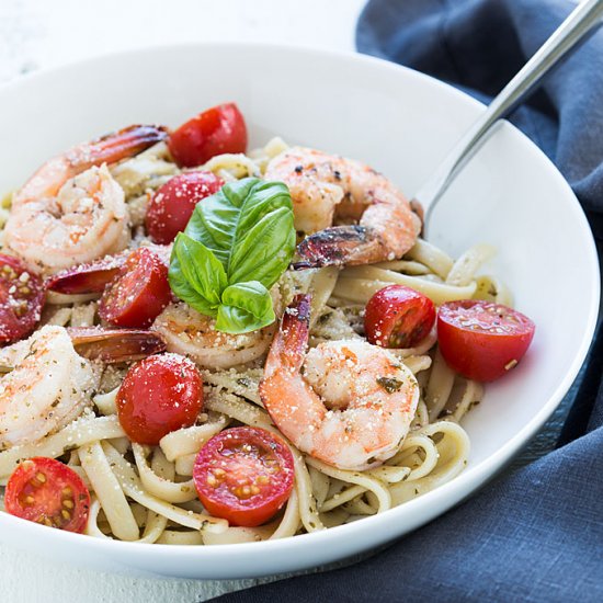 buttery shrimp over pesto pasta