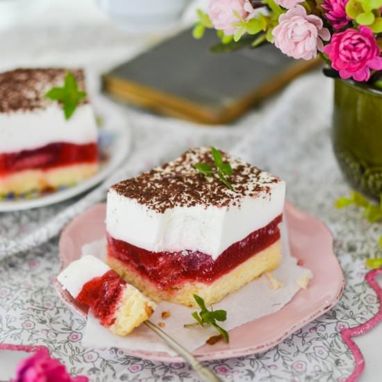 Cake with strawberry jelly and whip