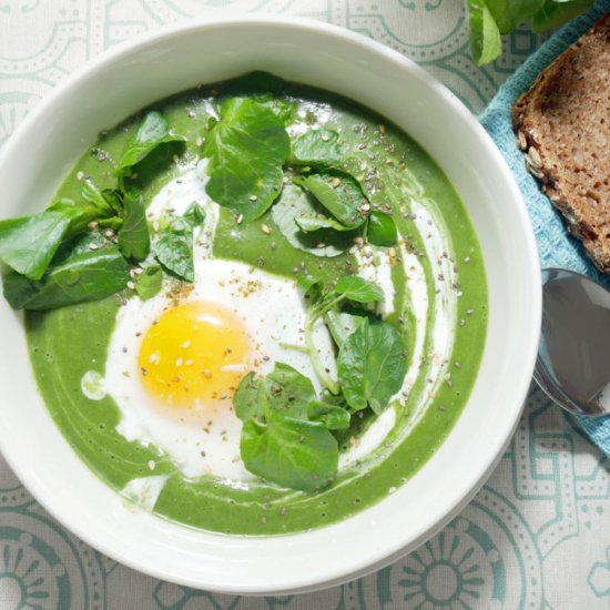 Spinach soup with sunny side up