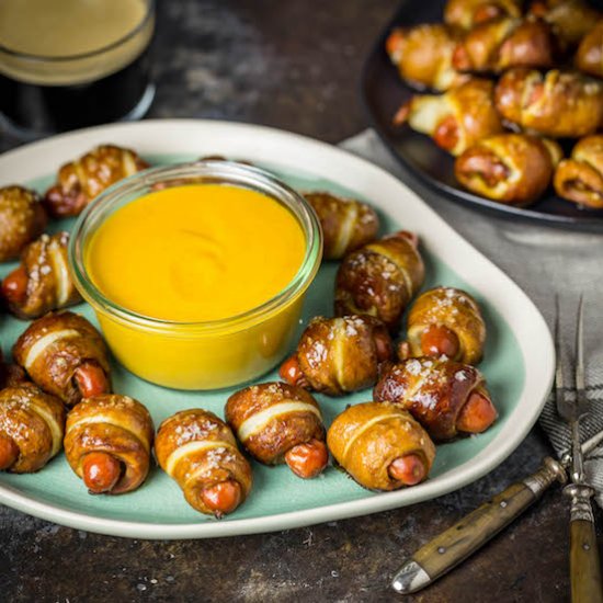 Pretzel pigs in a blanket w Cheddar