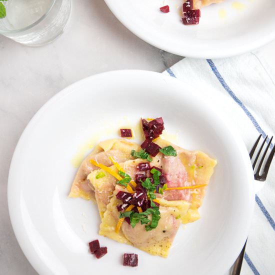 Beetroot ravioli with orange butter