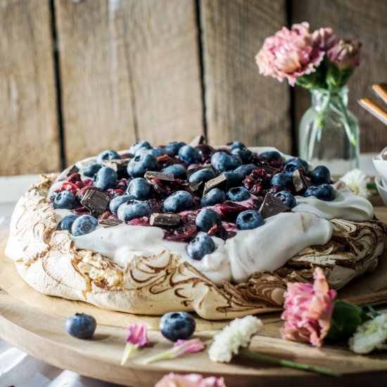 Chocolate Pavlova with Berry Compote