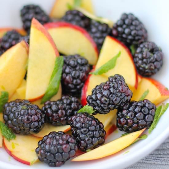 Fruit salad with ginger syrup, lime