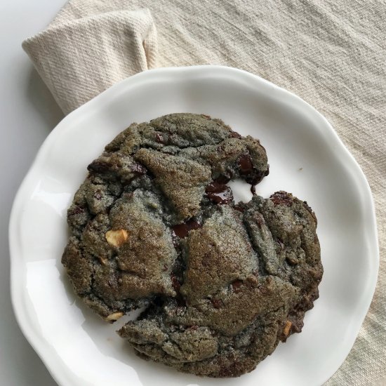 black tahini chocolate chip cookie