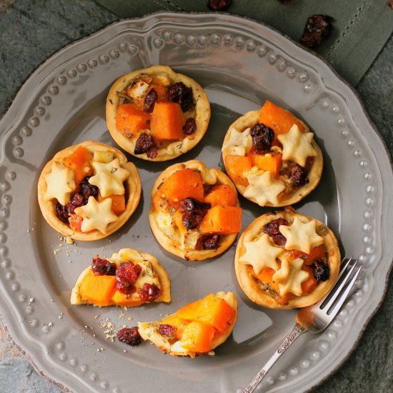 Butternut, brie and cranberry tarts