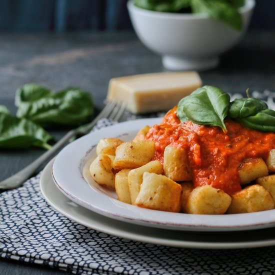 Parmesan gnocchi in tomato sauce