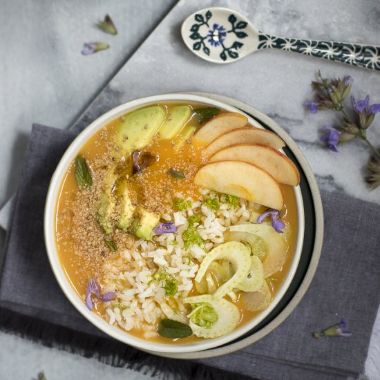 Veggie bowl with fresh carrot soup