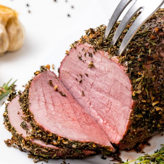 Garlic herb-crusted roast beef