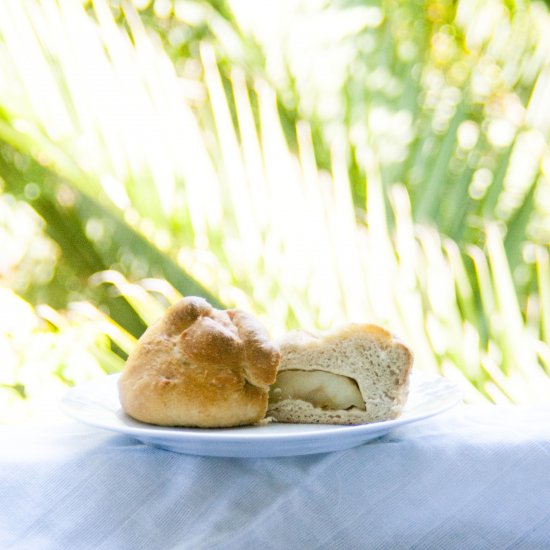 challah with a baked apple inside