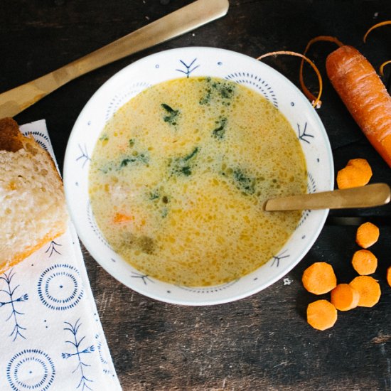 Sausage, kale, brie soup