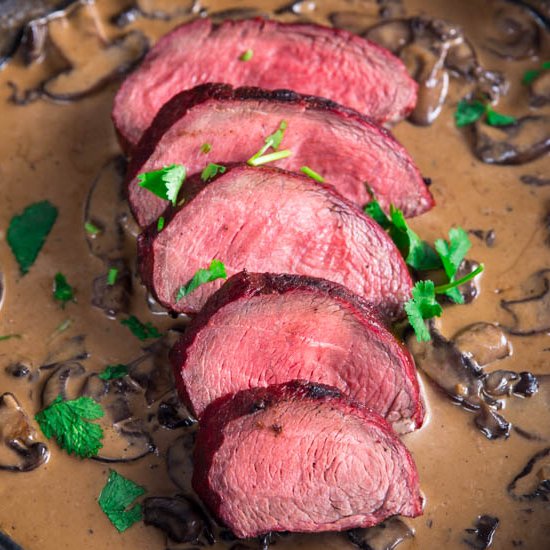 Steak with bourbon cream sauce