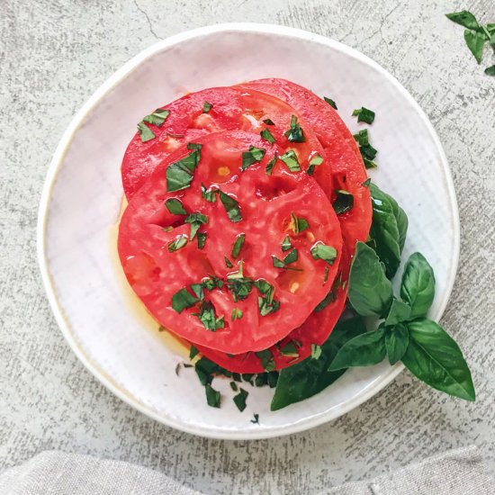 Tomato and basil salad with oil