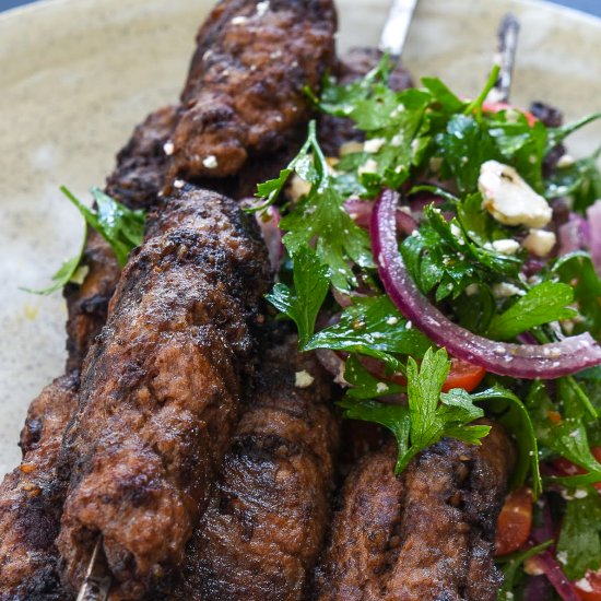 Grilled lamb & black pudding skewer