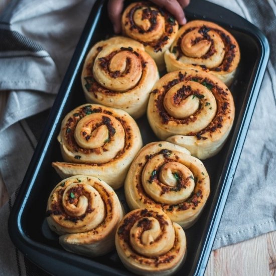 Feta and tomato stuffed bread rolls