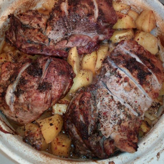 Baked ribs on potatoes