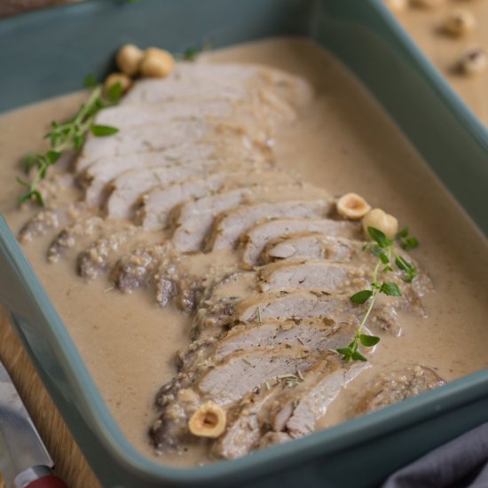 Baked pork loin with hazelnuts