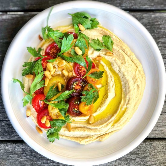 seasonal cherry tomato hummus bowl