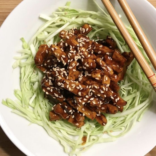 CRISPY SHREDDED TOFU OVER CABBAGE