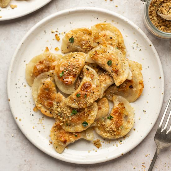 Mushroom and cabbage pierogi (V)