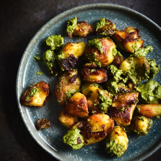 Crispy smashed potatoes with pesto