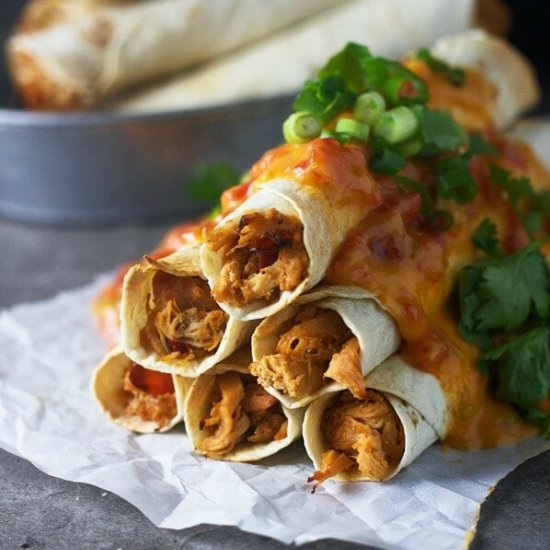 SPICY SMOTHERED CHICKEN FLAUTAS