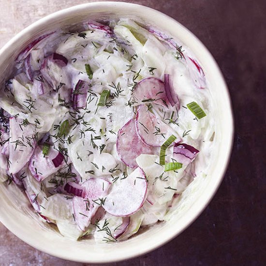 Creamy cucumber salad with radishes