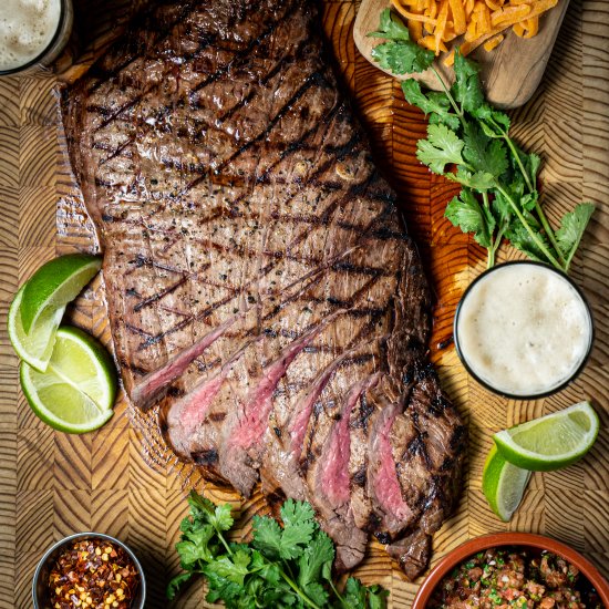 Marinated flank steak on the grill