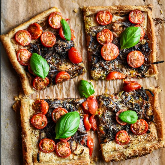 Caramelized onion and tomato tart