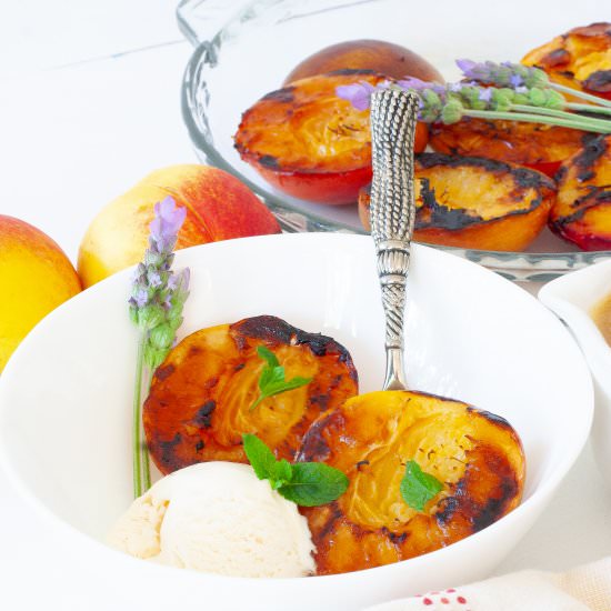 Roasted nectarines with caramel.