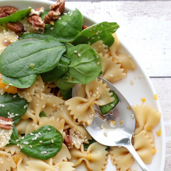 Bow tie pasta and spinach salad