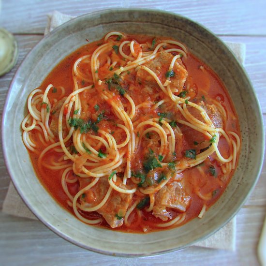 Stewed meat with spaghetti