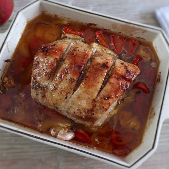 Pork loin in the oven with tomato