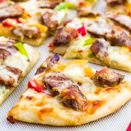 Sausage pepper onion white pizza