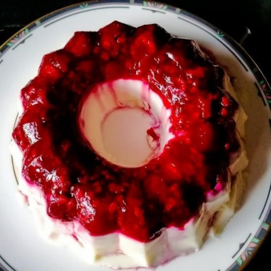 Milk pudding with raspberries