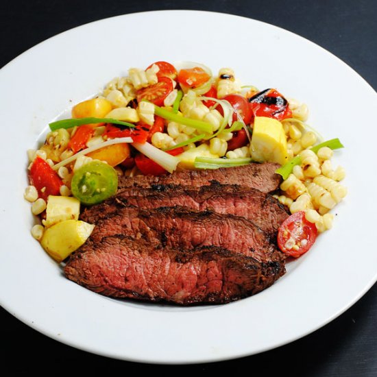 Grilled steak with corn salad