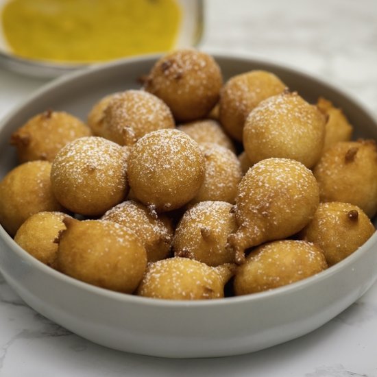 African beignets with mango sauce