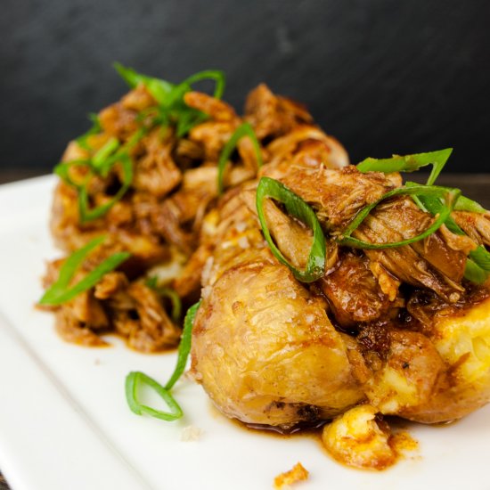 Pulled chicken on roasted potatoes