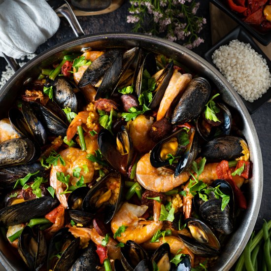 Paella with chicken and seafood