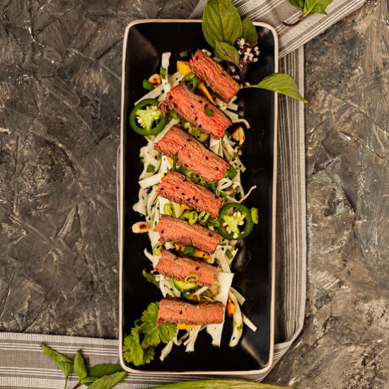 Asian Flank Steak over Mango Salad