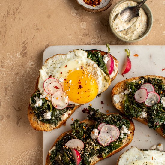 Fried egg tartine with braised kale